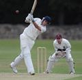 Matthew drives back over the bowlers head for 4.jpg